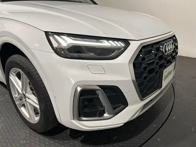 アウディ アウディ Ｑ５ 40TDIクワトロ Sライン 愛媛県 2021(令3)年 1.7万km グレイシアホワイトメタリック バーチャルコックピット/純正ナビゲーション/全方位カメラ/ETC/前後ドライブレコーダー/ACC/レーンキープアシスト/ブラインドスポットモニター/ハーフレザーシート/全席シートヒーター/前席パワーシート/ハンドルヒーター/置くだけ充電/オートホールド/プッシュスタート/スマートキー