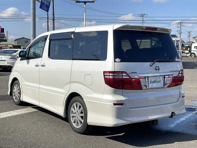 トヨタ アルファード Ｇ MS LTD 新潟県 2006(平18)年 13.5万km ホワイトパールマイカ 社外HDDナビ/（FM/AM/CD/DVD/BT/TV）/バックカメラ/ETC/両側パワースライドドア/ステアリングスイッチ/サンルーフ/純正フロアマット/後席用モニター（2台）/フロントグリル２つ車内積み込み