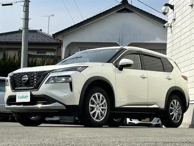 日産 エクストレイル G e－4ORCE 山形県 2023(令5)年 1.9万km ブリリアントホワイトパール ・禁煙車/・4WD/・法人ワンオーナー/・純正12インチインチナビ/（フルセグTV/Bluetooth/AppleCarPlay/AndroidAuto）/・アラウンドビューモニター/・ビルトインETC2.0/・純正LED/・オートライト/・プロパイロット/・エマージェンシーブレーキ/・LDW/・BSW/・RCTA/・デジタルインナーミラー/・電動パーキング/・オートホールド/・全席シートヒーター/・パワーシート（D+N）/・シートメモリ/・ステアリングリモコン/・革巻きステアリング/・ステアリングヒーター/・踏み間違い防止/・ふらつき警報/・前後ドライブレコーダー/・パワーバックドア/・AC100V/・スマートキー/・純正19インチアルミホイール/・ワイヤレス充電/・社外アルミスタッドレス有り