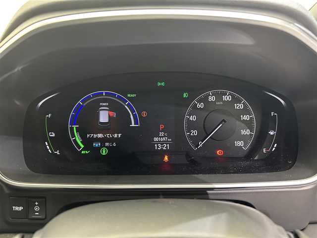 ホンダ オデッセイ ハイブリッド e:HEVアブソルート EXブラックED 三重県 2023(令5)年 0.2万km プラチナホワイトパール 純正１１インチナビ/CD/DVD/BT/MSV/フルセグTV/HDMI/マルチビューカメラ　/両側パワースライドドア　/本革シート　/オットマン　/シートヒーター　/ワイヤレス充電　/ＬＥＤヘッドライト/レーダークルーズコントロール/パワーバックドア/BSM/クリアランスソナー/スペアキー有り
