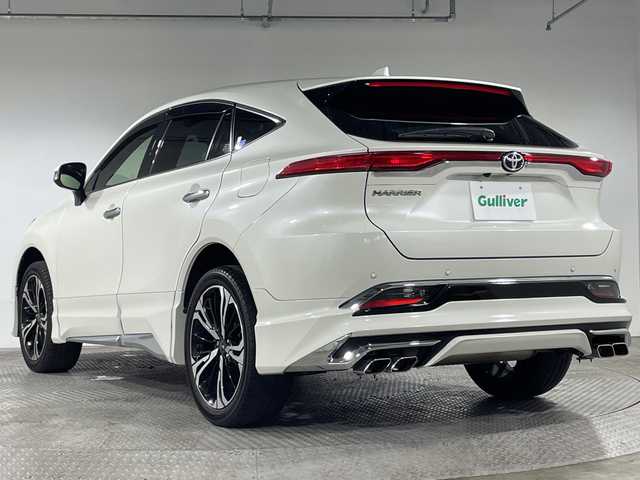 トヨタ ハリアー Z レザーパッケージ 神奈川県 2020(令2)年 5.1万km ホワイトパールクリスタルシャイン 4WD/調光パノラマルーフ/モデリスタエアロ【グランブレイズスタイル】【フロント/サイド/リアアンダー】/モデリスタ20インチアルミホイール/JBLプレミアムサウンドシステム/12.3型ディスプレイオーディオ/Tコネクトナビ/フルセグ　AM FM USB　Bluetooth　AUX/パノラミックビューモニター/デジタルインナーミラー/カラーヘッドアップディスプレイ/パワーバックドア/トヨタセーフティセンス/全車速追従機能付きクルーズコントロール/プリクラッシュセーフティー/レーントレーシングアシスト/アダプティブハイビームシステム/プロアクティブドライビングアシスト/ロードサインアシスト/ドライバー異常時対応システム/発進遅れ告知機能/ブラインドスポットモニター/リヤシートマインダー/フロントリアパーキングセンサー/本革シート/前席シートヒーター/パワーシート/運転席ポジションメモリー/革巻きステアリング/ステアリングヒーター/オートブレーキホールド/電動パーキング/プッシュスタート/スマートキー/LEDヘッドランプ/オートライト/純正リアスポイラー