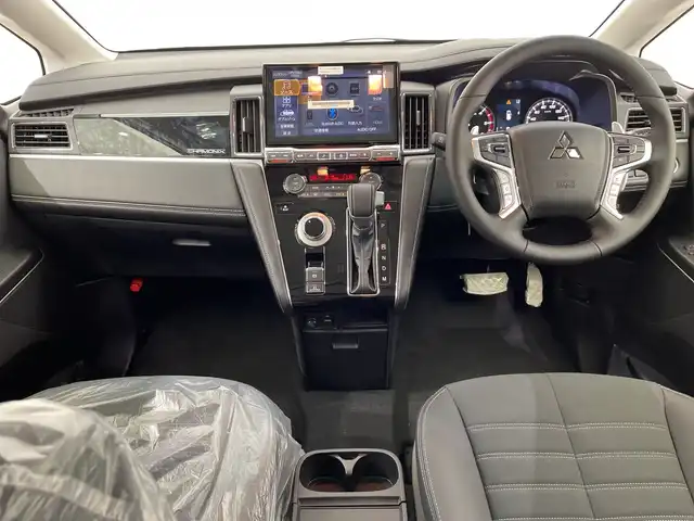 三菱 デリカＤ：５ シャモニー 栃木県 2025(令7)年 0.1千km 白Ⅱ 登録済未使用車/4WD/ターボ/アルパイン製 11インチナビ/（CDDVD/Bluetooth/フルセグTV）/12.8インチフリップダウンモニター/アラウンドビューカメラ/バックカメラ/三菱e-Assist/・衝突被害軽減ブレーキシステム/・踏み間違い衝突防止アシスト/・オートマチックハイビーム/・標識認識システム/・先行車発進通知/・車線逸脱警報システム/・車線逸脱防止支援機能/・ふらつき警報/・前方衝突予測警報/レーダークルーズコントロール/運転席パワーシート/前席シートヒーター/両側パワースライドドア/パワーバックドア/LEDヘッドライト/純正18インチAW/アイドリングストップ