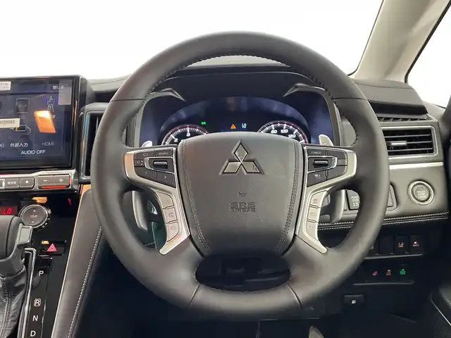 三菱 デリカＤ：５ シャモニー 栃木県 2025(令7)年 0.1千km 白Ⅱ 登録済未使用車/4WD/ターボ/アルパイン製 11インチナビ/（CDDVD/Bluetooth/フルセグTV）/12.8インチフリップダウンモニター/アラウンドビューカメラ/バックカメラ/三菱e-Assist/・衝突被害軽減ブレーキシステム/・踏み間違い衝突防止アシスト/・オートマチックハイビーム/・標識認識システム/・先行車発進通知/・車線逸脱警報システム/・車線逸脱防止支援機能/・ふらつき警報/・前方衝突予測警報/レーダークルーズコントロール/運転席パワーシート/前席シートヒーター/両側パワースライドドア/パワーバックドア/LEDヘッドライト/純正18インチAW/アイドリングストップ