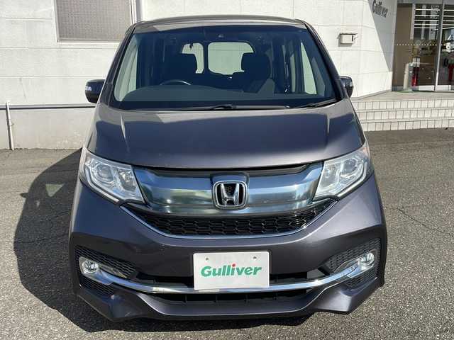 ホンダ ステップワゴン スパーダ ホンダセンシング 福井県 2016(平28)年 5.5万km モダンスティールM 登録時走行距離５４６０５ｋｍ/ワンオーナー/ターボ/ナビ装着スペシャルパッケージ/コンフォートビューパッケージ/純正メモリナビゲーション/（CD/DVD/BT）/フルセグテレビ/バックカメラ/ホンダセンシング/レーンキープアシスト/両側電動スライドドア/アダプティブクルーズコントロール/パドルシフト/ETC（ビルトイン）/純正16インチアルミホイール/LEDヘッドライト/フォグランプ/わくわくゲート/ステアリングリモコン/オートライト/プッシュスタート/スマートキー/保証書/取扱説明書