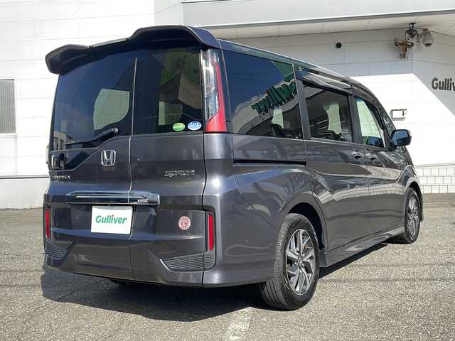 ホンダ ステップワゴン スパーダ ホンダセンシング 福井県 2016(平28)年 5.5万km モダンスティールM 登録時走行距離５４６０５ｋｍ/ワンオーナー/ターボ/ナビ装着スペシャルパッケージ/コンフォートビューパッケージ/純正メモリナビゲーション/（CD/DVD/BT）/フルセグテレビ/バックカメラ/ホンダセンシング/レーンキープアシスト/両側電動スライドドア/アダプティブクルーズコントロール/パドルシフト/ETC（ビルトイン）/純正16インチアルミホイール/LEDヘッドライト/フォグランプ/わくわくゲート/ステアリングリモコン/オートライト/プッシュスタート/スマートキー/保証書/取扱説明書