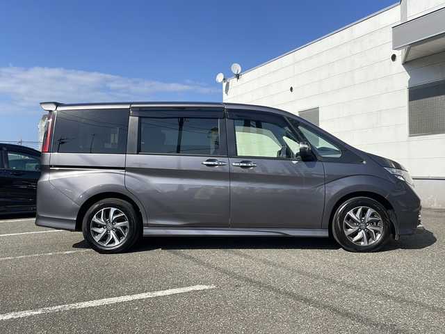 ホンダ ステップワゴン スパーダ ホンダセンシング 福井県 2016(平28)年 5.5万km モダンスティールM 登録時走行距離５４６０５ｋｍ/ワンオーナー/ターボ/ナビ装着スペシャルパッケージ/コンフォートビューパッケージ/純正メモリナビゲーション/（CD/DVD/BT）/フルセグテレビ/バックカメラ/ホンダセンシング/レーンキープアシスト/両側電動スライドドア/アダプティブクルーズコントロール/パドルシフト/ETC（ビルトイン）/純正16インチアルミホイール/LEDヘッドライト/フォグランプ/わくわくゲート/ステアリングリモコン/オートライト/プッシュスタート/スマートキー/保証書/取扱説明書