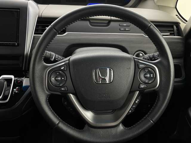 ホンダ フリード ハイブリット G ホンダセンシング 新潟県 2020(令2)年 3.9万km プラチナホワイトパール ワンオーナー　/バックモニター　/フルセグＴＶ(走行中視聴可能)　/メモリナビ(AM/FM/CD/DVD/BT)　/Ｂｌｕｅｔｏｏｔｈ接続　/ＡＷ付きスタッドレスタイヤ/ステアリングスイッチ　/両側パワースライドドア　/運転席助手席シートヒーター　/追従型クルーズコントロール　/保証書/取扱説明書/記録簿