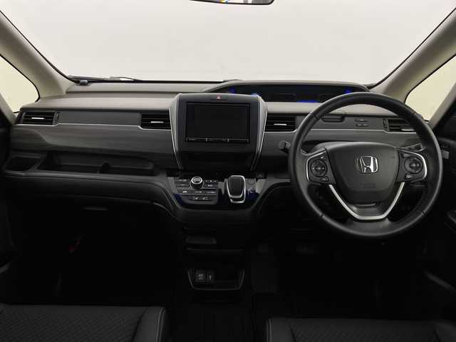 ホンダ フリード ハイブリット G ホンダセンシング 新潟県 2020(令2)年 3.9万km プラチナホワイトパール ワンオーナー　/バックモニター　/フルセグＴＶ(走行中視聴可能)　/メモリナビ(AM/FM/CD/DVD/BT)　/Ｂｌｕｅｔｏｏｔｈ接続　/ＡＷ付きスタッドレスタイヤ/ステアリングスイッチ　/両側パワースライドドア　/運転席助手席シートヒーター　/追従型クルーズコントロール　/保証書/取扱説明書/記録簿