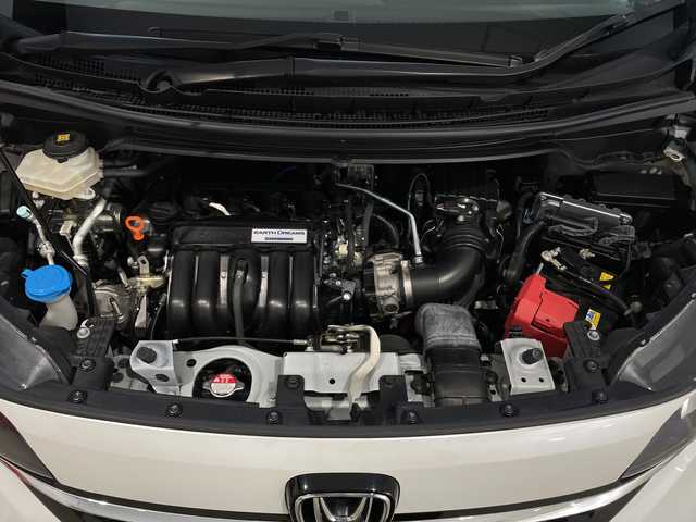 ホンダ フリード ハイブリット G ホンダセンシング 新潟県 2020(令2)年 3.9万km プラチナホワイトパール ワンオーナー　/バックモニター　/フルセグＴＶ(走行中視聴可能)　/メモリナビ(AM/FM/CD/DVD/BT)　/Ｂｌｕｅｔｏｏｔｈ接続　/ＡＷ付きスタッドレスタイヤ/ステアリングスイッチ　/両側パワースライドドア　/運転席助手席シートヒーター　/追従型クルーズコントロール　/保証書/取扱説明書/記録簿