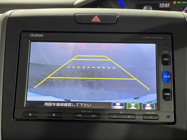 ホンダ フリード ハイブリット G ホンダセンシング 沖縄県 2017(平29)年 6万km ホワイトオーキッドパール 県外仕入れ　/禁煙車　/純正ナビ　ワンセグ　ＣＤ　Ｂｌｕｅｔｏｏｔｈ　/両側パワースライドドア　/ホンダセンシング/クルーズコントロール　/ビルトインＥＴＣ　/スマートキー　/スペアキー１本