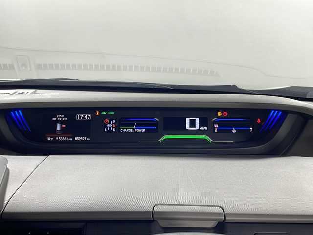 ホンダ フリード ハイブリット G ホンダセンシング 沖縄県 2017(平29)年 6万km ホワイトオーキッドパール 県外仕入れ　/禁煙車　/純正ナビ　ワンセグ　ＣＤ　Ｂｌｕｅｔｏｏｔｈ　/両側パワースライドドア　/ホンダセンシング/クルーズコントロール　/ビルトインＥＴＣ　/スマートキー　/スペアキー１本