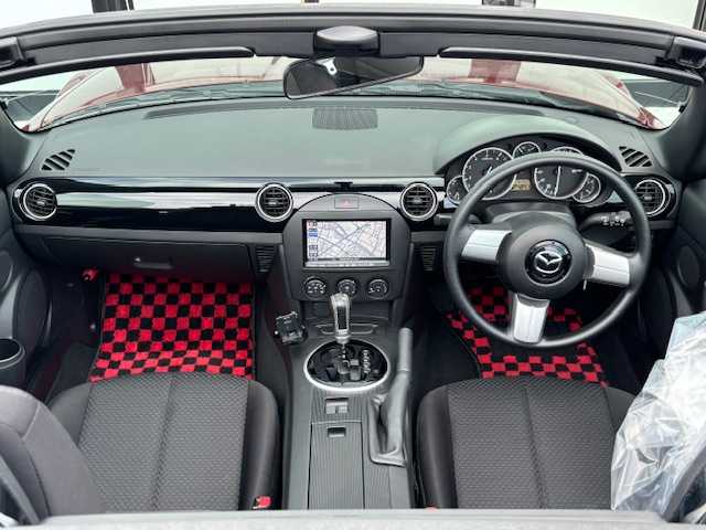 マツダ ロードスター 宮城県 2006(平18)年 2.6万km カッパーレッドマイカ 登録時走行距離25254km/ワンオーナー/社外ストラーダナビ/CD・DVD・Bluetooth・フルセグTV/バックカメラ/HID/社外フロアマット/フォグランプ/パドルシフト/純正アルミホイール/リモコンキー/AC