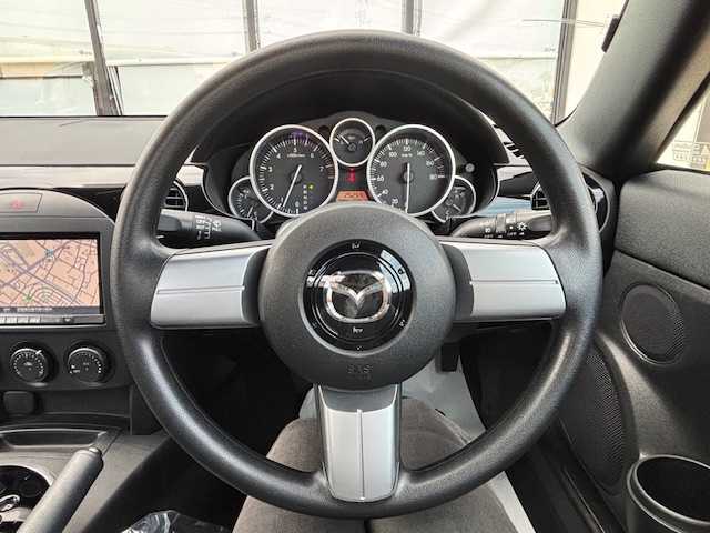 マツダ ロードスター 宮城県 2006(平18)年 2.6万km カッパーレッドマイカ 登録時走行距離25254km/ワンオーナー/社外ストラーダナビ/CD・DVD・Bluetooth・フルセグTV/バックカメラ/HID/社外フロアマット/フォグランプ/パドルシフト/純正アルミホイール/リモコンキー/AC