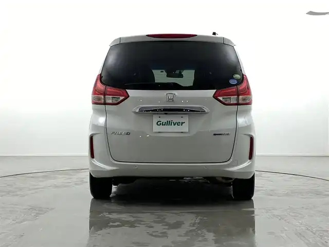 ホンダ フリード ハイブリット G ホンダセンシング 福井県 2019(令1)年 4.6万km プラチナホワイトパール Sパッケージ/-本革巻きステアリング/-コンビシート&専用インテリア/-15インチアルミホイール/-シートバックアッパーポケット/純正9インチプレミアムインターナビ/-AM/FM/DVD/BT/USB/HDMI/フルセグTV/純正ドライブレコーダー前後/純正フロアマット/両側パワースライドドア/バックカメラ/ETC/ハーフレザーシート/シートヒーター/衝突被害軽減システム/レーダークルーズコントロール/レーンキープアシスト/横滑り防止装置/アイドリングストップ/オートLEDライト/ステアリングスイッチ