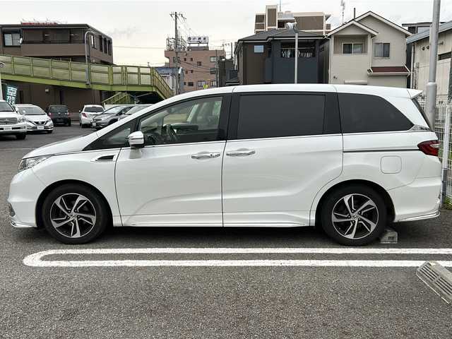 ホンダ オデッセイ アブソルート 兵庫県 2013(平25)年 13.6万km ホワイトオーキッドパール 8人乗り/あんしんパッケージ/シティブレーキアクティブシステム/サイド、カーテンエアバック/Cパッケージ/両側パワースライドドア/アウターウェルカムライト/コンフォートビューパッケージ/純正インターナビ/CD/DVD/フルセグTV/HDMI/純正フリップダウンモニター/前後ドライブレコーダー/純正フロアマット/スマートキー/エンジンプッシュスタート/ビルトインETC/パドルシフト/保証書/取説/スペアキー