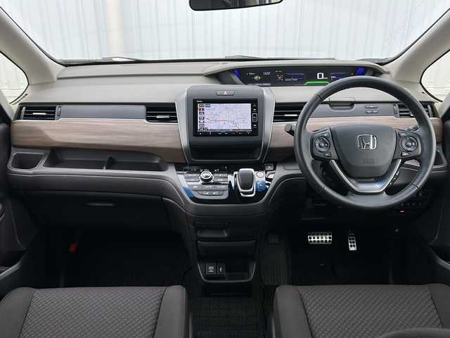 ホンダ フリード ハイブリット G ホンダセンシング 三重県 2020(令2)年 4.4万km プラチナホワイトパール 純正ナビ　/バックカメラ　/前席シートヒーター　/ホンダセンシング　/スペアキー/両側パワースライドドア/ビルトインＥＴＣ　/前後ドライブレコーダー/コーナーセンサー/レーダークルーズコントロール/レーンキープアシスト/LEDヘッドライト/オートライト/純正フロアマット/ステアリングスイッチ /電動格納ミラー /禁煙車