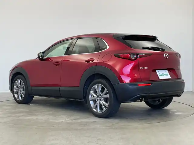 マツダ ＣＸ－３０ 新潟県 2020(令2)年 5万km ソウルレッドクリスタルM 純正メモリナビ（CD・DVD）/アラウンドビューモニター　/BOSEサウンド　/前席パワーシート/前席シートヒーター　/D席メモリーシート　/電動リアゲート/LEDオートライト　/オートマチックハイビーム/衝突被害軽減システム　/追従クルーズコントロール　/前後コーナーセンサー　/前後ドライブレコーダー　/ビルトインETC/アイドリングストップ/ブラインドスポットモニター/ヘッドアップディスプレイ/パドルシフト/レザーステアリング/ステアリングヒーター/MTモード付AT/純正フロアマット/純正１８インチアルミホイール/スマートキー