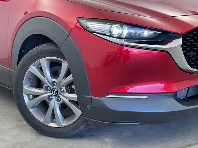 マツダ ＣＸ－３０ 新潟県 2020(令2)年 5万km ソウルレッドクリスタルM 純正メモリナビ（CD・DVD）/アラウンドビューモニター　/BOSEサウンド　/前席パワーシート/前席シートヒーター　/D席メモリーシート　/電動リアゲート/LEDオートライト　/オートマチックハイビーム/衝突被害軽減システム　/追従クルーズコントロール　/前後コーナーセンサー　/前後ドライブレコーダー　/ビルトインETC/アイドリングストップ/ブラインドスポットモニター/ヘッドアップディスプレイ/パドルシフト/レザーステアリング/ステアリングヒーター/MTモード付AT/純正フロアマット/純正１８インチアルミホイール/スマートキー