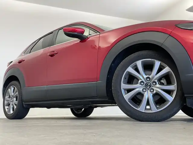 マツダ ＣＸ－３０ 新潟県 2020(令2)年 5万km ソウルレッドクリスタルM 純正メモリナビ（CD・DVD）/アラウンドビューモニター　/BOSEサウンド　/前席パワーシート/前席シートヒーター　/D席メモリーシート　/電動リアゲート/LEDオートライト　/オートマチックハイビーム/衝突被害軽減システム　/追従クルーズコントロール　/前後コーナーセンサー　/前後ドライブレコーダー　/ビルトインETC/アイドリングストップ/ブラインドスポットモニター/ヘッドアップディスプレイ/パドルシフト/レザーステアリング/ステアリングヒーター/MTモード付AT/純正フロアマット/純正１８インチアルミホイール/スマートキー