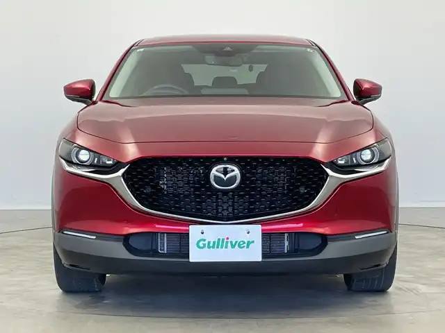 マツダ ＣＸ－３０ 新潟県 2020(令2)年 5万km ソウルレッドクリスタルM 純正メモリナビ（CD・DVD）/アラウンドビューモニター　/BOSEサウンド　/前席パワーシート/前席シートヒーター　/D席メモリーシート　/電動リアゲート/LEDオートライト　/オートマチックハイビーム/衝突被害軽減システム　/追従クルーズコントロール　/前後コーナーセンサー　/前後ドライブレコーダー　/ビルトインETC/アイドリングストップ/ブラインドスポットモニター/ヘッドアップディスプレイ/パドルシフト/レザーステアリング/ステアリングヒーター/MTモード付AT/純正フロアマット/純正１８インチアルミホイール/スマートキー