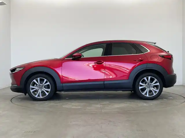 マツダ ＣＸ－３０ 新潟県 2020(令2)年 5万km ソウルレッドクリスタルM 純正メモリナビ（CD・DVD）/アラウンドビューモニター　/BOSEサウンド　/前席パワーシート/前席シートヒーター　/D席メモリーシート　/電動リアゲート/LEDオートライト　/オートマチックハイビーム/衝突被害軽減システム　/追従クルーズコントロール　/前後コーナーセンサー　/前後ドライブレコーダー　/ビルトインETC/アイドリングストップ/ブラインドスポットモニター/ヘッドアップディスプレイ/パドルシフト/レザーステアリング/ステアリングヒーター/MTモード付AT/純正フロアマット/純正１８インチアルミホイール/スマートキー