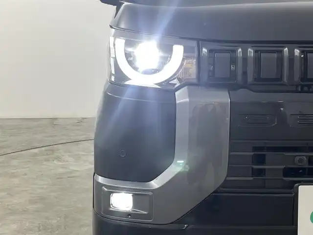 三菱 デリカミニ T プレミアム 福島県 2024(令6)年 1.2万km クールシルバーM/アメジストブラック マイパイロット搭載車/・衝突被害軽減ブレーキ/・車線逸脱警報装置/・踏み間違い防止/・オートハイビーム/・レーダークルーズコントロール/ディスプレイオーディオ/・BT/USB/FM/AM/・android　Auto/・Apple　CarPlay/・バックカメラ/・アラウンドビューモニター/・ETC/電子パーキング/オートブレーキホールド/両側パワースライドドア/革張ステアリング/・ステアリングリモコン/・パドルシフト/・ステアリングヒーター/ハーフレザーシート/・D+N席シートヒーター/・ベンチシート/プッシュスタート/・スマートキー/LEDヘッドライト/・フォグライト/・オートライト/・ヘッドライトレベライザー/アイドリングストップ/電動格納ミラー/・ウィンカーミラー/・オートミラー/コーナーセンサー/純正15インチアルミ/純正フロアマット/ルーフレール