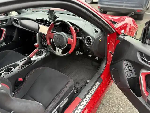 トヨタ ８６ GT 東京都 2012(平24)年 6万km 赤 ワンオーナー/TRD：Fエアロ＆マフラー/MODELLISTA：Sエアロ＆Rエアロ/RAYS18インチホイール/RSR TI200ダウンサス/ドライブレコーダー（DRV-350）/SDナビ（AVIC-MRZ90）/・フルセグTV/・Bluetooth接続/純正フロアマット/オートライト/スマートキー/保証書/取扱説明書