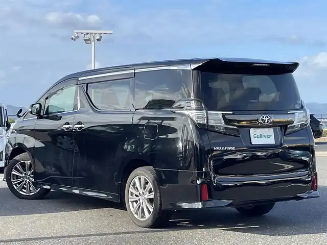 トヨタ ヴェルファイア 2.5Z Aエディデョン ゴールデンアイズ 島根県 2017(平29)年 4.6万km ブラック 登録時走行距離 46049km/ワンオーナー/取扱説明書【車両/ナビ】/保証書/純正10インチSDナビ【CD/DVD/Bluetooth】/フルセグテレビ/バックカメラ/フリップダウンモニター/両側パワースライドドア/パワーバックドア/クルーズコントロール/プッシュスタート（スペアスマート×1）/ウッドコンピハンドル/オットマンシート/ETC/純正18インチアルミ