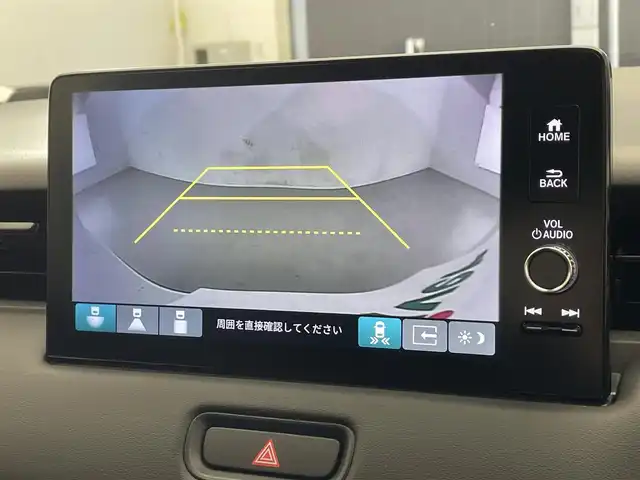 ホンダ ヴェゼル ハイブリッド e:HEV Z 滋賀県 2025(令7)年 0.1千km プラチナホワイトパール 登録済未使用車/純正9インチナビ/（Bluetooth/フルセグTV/Apple CarPlay/Android Auto)/ハーフレザーシート/バックカメラ/クリアランスソナー/電動リアゲート/LEDヘッドライト/オートライト/オートマティックハイビーム/ブラインドスポットモニター/ステアリングヒーター/D・N席シートヒーター/純正ビルトインETC/衝突軽減ブレーキ/MTモード付AT/パドルシフト/スマートキー/スペアキー/プッシュスタート