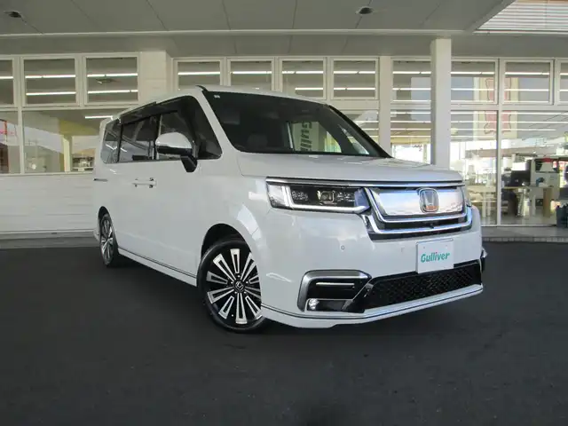 ホンダ ステップワゴン スパーダ eHEV プレミアムライン 千葉県 2023(令5)年 2.2万km プラチナホワイトパール ワンオーナー/純正11.4インチコネクトナビ、フルセグTV/全方位カメラ/オーディオ【SD/DVD/CD/BT/USB】/純正15.6インチフリップダウンモニター/純正DIATONE SOUNDシステム/ホンダセンシング/LEDヘッドライト&LEDフォグ/純正17インチアルミホイール/無限カバー付きウィンカーミラー/純正前後ドライブレコーダー/前席、２列目シートヒーター/フロント、リアコーナーセンサー/両側パワースライドドア/パワーバックドア/クルーズコントロール/ハーフレザーシート/前席&セカンドシートヒーター/スイッチ付き革巻きステアリング/LEDルームランプ/純正ETC2.0/純正ドライブレコーダー（前後）/スカッフイルミネーション/ディーラー点検記録簿(R6/R7)