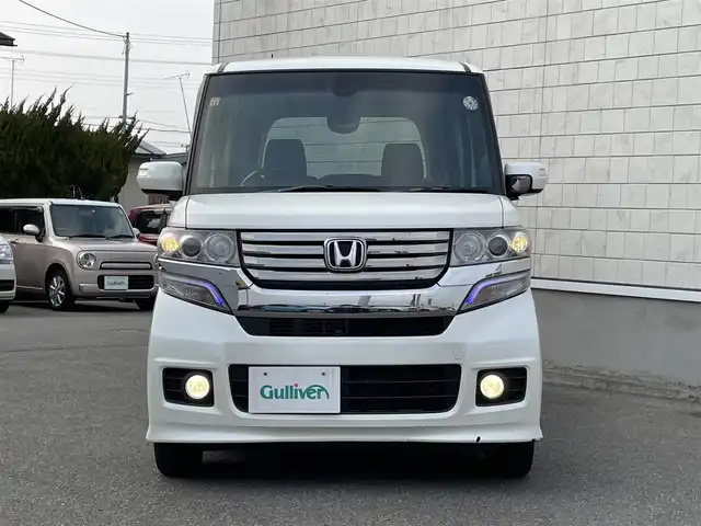 ホンダ Ｎ ＢＯＸ カスタム G ターボSSパッケージ 山形県 2014(平26)年 10.3万km プレミアムホワイトパール 禁煙車/4WD/純正メモリーナビ/・TV/AM/FM/CD/DVD/Bluetooth/クルーズコントロール/アイドリングストップ/衝突被害軽減ブレーキ/横滑り防止装置/盗難防止装置/HIDヘッドライト/オートライト/フロントフォグランプ/両側パワースライドドア/バックカメラ/シートヒーター（D/N席）/パドルシフト/プッシュスタート/スマートキー/純正ドアバイザー/純正フロアマット/ETC/夏タイヤ積み込み/保証書/取扱説明書