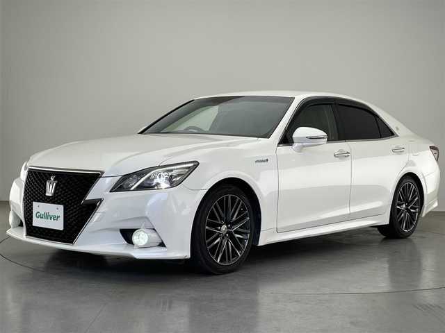 トヨタ クラウン ハイブリッド アスリートS ブラックスタイル 愛知県 2015(平27)年 8.4万km ホワイトパールクリスタルシャイン 純正ＨＤＤナビ　フルセグＴＶ　ＤＶＤ　Ｂｌｕｅｔｏｏｔｈ　黒ｘ茶革コンビシート　シートヒーター　シートベンチレーション　ハンドルヒーター　バックカメラ　ＥＴＣ　クルコン　パワーシート　純正18インチAW　禁煙車