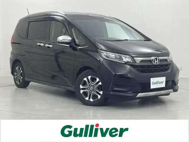 ホンダ フリード クロスター ホンダセンシング 茨城県 2020(令2)年 7.2万km クリスタルブラックパール 社外ナビ/バックカメラ/フルセグ/衝突被害軽減ブレーキ/車線逸脱抑制装置/レーダークルーズコントロール/ソナー/両側電動スライドドア/ETC/純正15インチAW/LEDヘッドライト/スマートキー