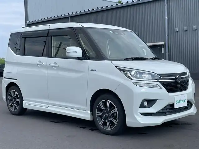 スズキ ソリオ バンディット HV MV 千葉県 2018(平30)年 2.1万km ピュアホワイトP 両側パワースライドドア /衝突軽減/レーンキープアシスト/社外7インチナビ/ワンセグTV/バックカメラ/LEDヘッドライト/ステアリングスイッチ/クルーズコントロール/スマートキー/プッシュスタート/フロアマット/ドアバイザー/純正15インチアルミ