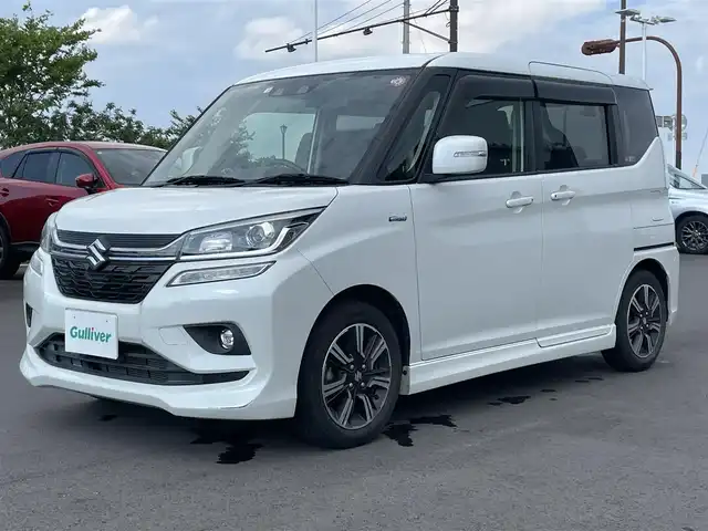 スズキ ソリオ バンディット HV MV 千葉県 2018(平30)年 2.1万km ピュアホワイトP 両側パワースライドドア /衝突軽減/レーンキープアシスト/社外7インチナビ/ワンセグTV/バックカメラ/LEDヘッドライト/ステアリングスイッチ/クルーズコントロール/スマートキー/プッシュスタート/フロアマット/ドアバイザー/純正15インチアルミ