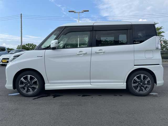スズキ ソリオ バンディット HV MV 千葉県 2018(平30)年 2.1万km ピュアホワイトP 両側パワースライドドア /衝突軽減/レーンキープアシスト/社外7インチナビ/ワンセグTV/バックカメラ/LEDヘッドライト/ステアリングスイッチ/クルーズコントロール/スマートキー/プッシュスタート/フロアマット/ドアバイザー/純正15インチアルミ