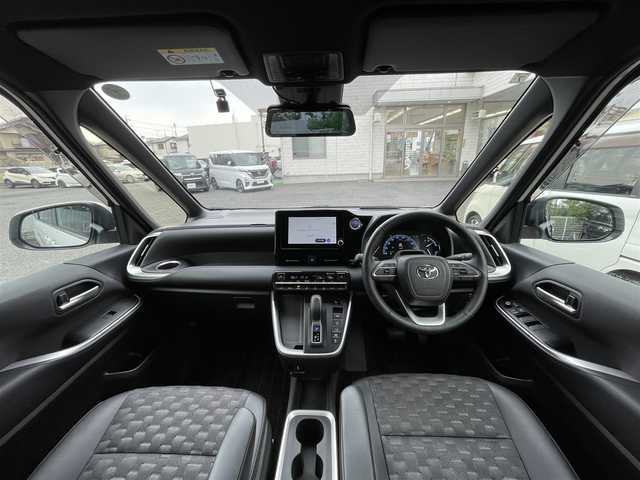 トヨタ ヴォクシー ハイブリッド S－Z 埼玉県 2023(令5)年 2万km ホワイトパールクリスタルシャイン ワンオーナー/メーカーオプションナビ(FM/AM/USB/BT/Wi-Fi/Miracast)/イモビライザー/デジタルミラー型ドラレコ/バックカメラ/アラウンドビューモニター/フリップダウンモニター/パーキングアシスト/サンシェード/オートライト/衝突軽減ブレーキ/電動格納ミラー/三列シート/シートヒーター(前・中シート)/両側スライドドア/オットマン/純正フロアマット/クルーズコントロール(追従)/横滑り防止/ISOFIX/ドアバイザー