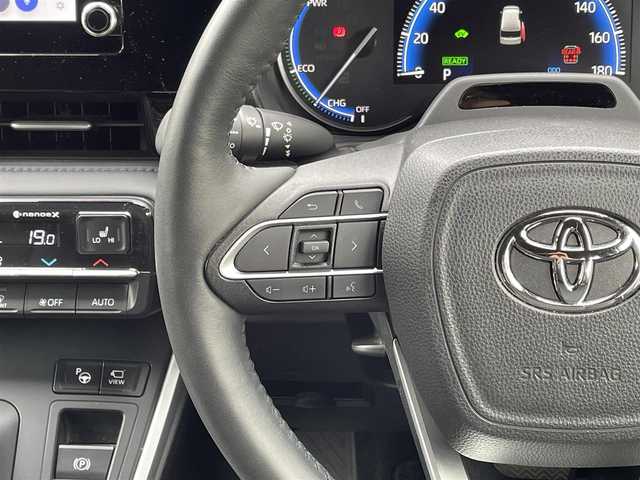 トヨタ ヴォクシー ハイブリッド S－Z 埼玉県 2023(令5)年 2万km ホワイトパールクリスタルシャイン ワンオーナー/メーカーオプションナビ(FM/AM/USB/BT/Wi-Fi/Miracast)/イモビライザー/デジタルミラー型ドラレコ/バックカメラ/アラウンドビューモニター/フリップダウンモニター/パーキングアシスト/サンシェード/オートライト/衝突軽減ブレーキ/電動格納ミラー/三列シート/シートヒーター(前・中シート)/両側スライドドア/オットマン/純正フロアマット/クルーズコントロール(追従)/横滑り防止/ISOFIX/ドアバイザー