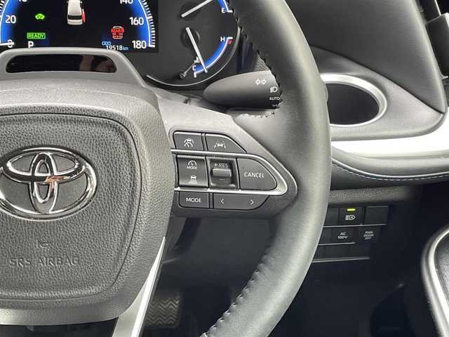 トヨタ ヴォクシー ハイブリッド S－Z 埼玉県 2023(令5)年 2万km ホワイトパールクリスタルシャイン ワンオーナー/メーカーオプションナビ(FM/AM/USB/BT/Wi-Fi/Miracast)/イモビライザー/デジタルミラー型ドラレコ/バックカメラ/アラウンドビューモニター/フリップダウンモニター/パーキングアシスト/サンシェード/オートライト/衝突軽減ブレーキ/電動格納ミラー/三列シート/シートヒーター(前・中シート)/両側スライドドア/オットマン/純正フロアマット/クルーズコントロール(追従)/横滑り防止/ISOFIX/ドアバイザー