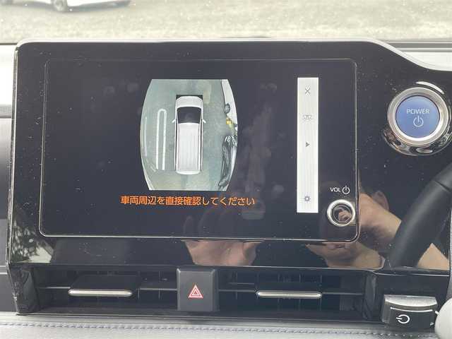 トヨタ ヴォクシー ハイブリッド S－Z 埼玉県 2023(令5)年 2万km ホワイトパールクリスタルシャイン ワンオーナー/メーカーオプションナビ(FM/AM/USB/BT/Wi-Fi/Miracast)/イモビライザー/デジタルミラー型ドラレコ/バックカメラ/アラウンドビューモニター/フリップダウンモニター/パーキングアシスト/サンシェード/オートライト/衝突軽減ブレーキ/電動格納ミラー/三列シート/シートヒーター(前・中シート)/両側スライドドア/オットマン/純正フロアマット/クルーズコントロール(追従)/横滑り防止/ISOFIX/ドアバイザー