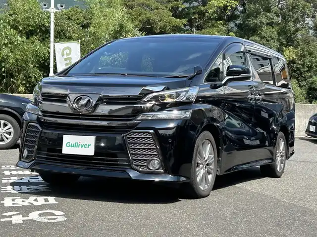 トヨタ ヴェルファイア Z Aエディション ゴールデンアイズ 長崎県 2017(平29)年 9.6万km ブラック 純正SDナビ(FM/AM/フルセグ/BT/CD/DVD)/バックカメラ/プッシュスタート/スマートキー/ビルトインETC/純正フロアマット/純正18インチアルミホイール/ドアバイザー/社外フリップダウンモニター/2列目オットマン/ルーフカラーイルミネーション/両側パワスラ/パワーバックドア/ABS/横滑り防止装置/盗難防止装置/オートライト/SRSダブル・サイドエアバッグ/SRSカーテンエアバッグ/ISOFIX/取扱説明書/保証書/スペアキー