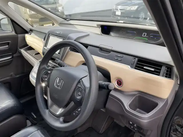 ホンダ フリード ハイブリット G 埼玉県 2018(平30)年 11.8万km プレミアムスパークルブラックパール (株)IDOMが運営する【じしゃロン鳩ヶ谷店】の自社ローン専用車両になりますこちらは現金またはオートローンご利用時の価格です。自社ローンご希望の方は別途その旨お申付け下さい/登録時117440km/後席キャプテンシート/純正メモリナビ(品番:AVIC-MRZ099)/・AM/FM・CD/DVD・BT・MSV(HDD)/バックカメラ/先行車発進お知らせ機能/ビルトインETC/クルーズコントロール/前方ドライブレコーダー(品番:DRY-ST1600)/両側スライドドア/・右側イージークローザードア/・左側パワースライドドア/後席ロールサンシェード/ウォークスルー/3列シート/フルフラットシート/純正フロアマット/社外シートカバー/オートライト/純正LEDヘッドライト/プッシュスタート/スマートキー/ドアバイザー/横滑り防止機能/ワイパーデアイサー