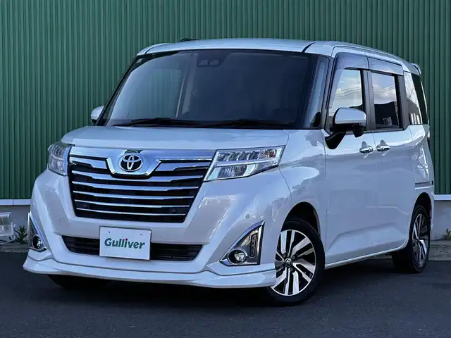トヨタ ルーミー カスタムG 宮城県 2019(令1)年 5.8万km パールホワイトⅢ コンフォートパッケージ/・シートヒーター（運転席/助手席）/・シートバックテーブル（運転席/助手席）/＝＝＝/モデリスタリアスポイラー/スマートアシスト3/・衝突回避支援ブレーキ機能/・衝突警報機能/・車線逸脱警報機能/・誤発進抑制制御機能/・先行車発進お知らせ機能/・オートハイビーム/・コーナーセンサー/アルパイン9インチナビ（X9Z）/・CD/DVD/・Bluetooth/・フルセグTV/バックカメラ/ビルトインETC/両側パワースライドドア/革巻きステアリング/ステアリングスイッチ/クルーズコントロール/革調シートカバー/LEDヘッドランプ/フォグランプ/オートライト/スマートキー＆プッシュスタート/電動格納ミラー/純正14インチAW/純正ドアバイザー/純正フロアマット/Wエアバッグ