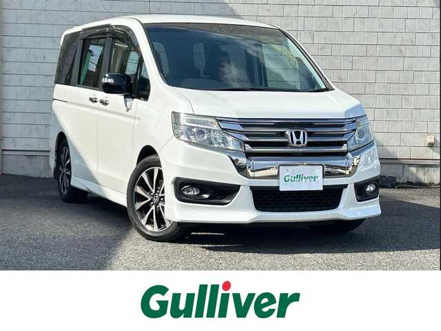 ホンダ ステップワゴン スパーダ Z クールスピリット 大分県 2014(平26)年 7.3万km ホワイトオーキッドパール ・ハーフレザーシート　プライムスムースファブリック/・純正ナビ/　ワンセグテレビ/　DVD/　Bluetooth/　SD/　ラジオ/・両側パワースライドドア/・3列目床下格納シート/・アイドリングストップ/・エコアシスト/・ETC/・パドルシフト/・ステアリングスイッチ/・横滑り制御システム/・ウィンカーミラー/・革巻きステアリング/・革巻きセレクトレバー/・社外フォグランプ/・純正17インチアルミホイル/・プライバシーガラス/・ドアバイザー/・保証書/・スペアキー１本
