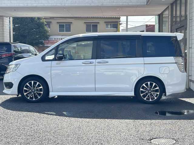 ホンダ ステップワゴン スパーダ Z クールスピリット 大分県 2014(平26)年 7.3万km ホワイトオーキッドパール ・ハーフレザーシート　プライムスムースファブリック/・純正ナビ/　ワンセグテレビ/　DVD/　Bluetooth/　SD/　ラジオ/・両側パワースライドドア/・3列目床下格納シート/・アイドリングストップ/・エコアシスト/・ETC/・パドルシフト/・ステアリングスイッチ/・横滑り制御システム/・ウィンカーミラー/・革巻きステアリング/・革巻きセレクトレバー/・社外フォグランプ/・純正17インチアルミホイル/・プライバシーガラス/・ドアバイザー/・保証書/・スペアキー１本