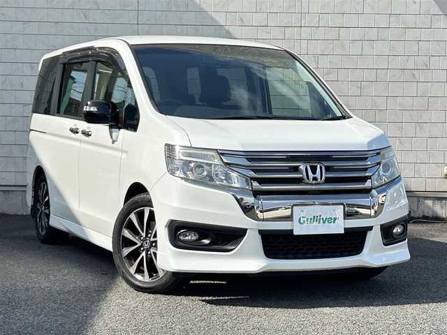 ホンダ ステップワゴン スパーダ Z クールスピリット 大分県 2014(平26)年 7.3万km ホワイトオーキッドパール ・ハーフレザーシート　プライムスムースファブリック/・純正ナビ/　ワンセグテレビ/　DVD/　Bluetooth/　SD/　ラジオ/・両側パワースライドドア/・3列目床下格納シート/・アイドリングストップ/・エコアシスト/・ETC/・パドルシフト/・ステアリングスイッチ/・横滑り制御システム/・ウィンカーミラー/・革巻きステアリング/・革巻きセレクトレバー/・社外フォグランプ/・純正17インチアルミホイル/・プライバシーガラス/・ドアバイザー/・保証書/・スペアキー１本