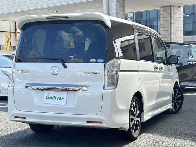 ホンダ ステップワゴン スパーダ Z クールスピリット 大分県 2014(平26)年 7.3万km ホワイトオーキッドパール ・ハーフレザーシート　プライムスムースファブリック/・純正ナビ/　ワンセグテレビ/　DVD/　Bluetooth/　SD/　ラジオ/・両側パワースライドドア/・3列目床下格納シート/・アイドリングストップ/・エコアシスト/・ETC/・パドルシフト/・ステアリングスイッチ/・横滑り制御システム/・ウィンカーミラー/・革巻きステアリング/・革巻きセレクトレバー/・社外フォグランプ/・純正17インチアルミホイル/・プライバシーガラス/・ドアバイザー/・保証書/・スペアキー１本
