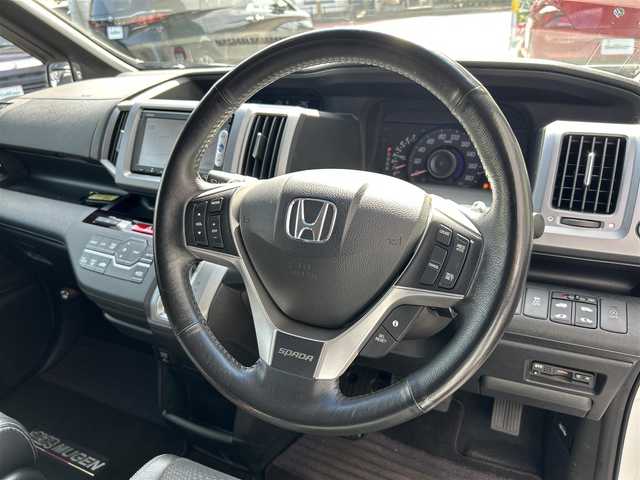 ホンダ ステップワゴン スパーダ Z クールスピリット 大分県 2014(平26)年 7.3万km ホワイトオーキッドパール ・ハーフレザーシート　プライムスムースファブリック/・純正ナビ/　ワンセグテレビ/　DVD/　Bluetooth/　SD/　ラジオ/・両側パワースライドドア/・3列目床下格納シート/・アイドリングストップ/・エコアシスト/・ETC/・パドルシフト/・ステアリングスイッチ/・横滑り制御システム/・ウィンカーミラー/・革巻きステアリング/・革巻きセレクトレバー/・社外フォグランプ/・純正17インチアルミホイル/・プライバシーガラス/・ドアバイザー/・保証書/・スペアキー１本