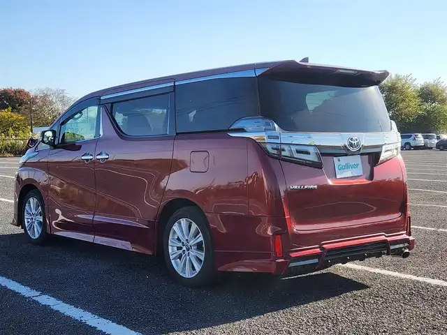 トヨタ ヴェルファイア Z Aエディション 群馬県 2018(平30)年 1.8万km ダークレッドマイカメタリック 純正10型ナビ/フルセグTV/純正12.1型後席ディスプレイ/両側パワースライドドア/バックモニター/ビルトインETC2.0/ドライブレコーダー/レーダークルーズコントロール/クリアランスソナー/セーフティセンス/・衝突被害軽減ブレーキ/・車線逸脱防止支援/・標識認識/・オートマチックハイビーム/2眼LEDヘッドランプ/デュアルオートエアコン/革巻きステアリング/2列目リラックスキャプテンシート/助手席・2列目オットマン/純正18インチアルミホイール/スマートキー/プッシュエンジンスタート/禁煙車