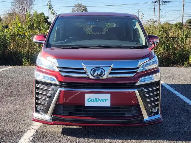 トヨタ ヴェルファイア Z Aエディション 群馬県 2018(平30)年 1.8万km ダークレッドマイカメタリック 純正10型ナビ/フルセグTV/純正12.1型後席ディスプレイ/両側パワースライドドア/バックモニター/ビルトインETC2.0/ドライブレコーダー/レーダークルーズコントロール/クリアランスソナー/セーフティセンス/・衝突被害軽減ブレーキ/・車線逸脱防止支援/・標識認識/・オートマチックハイビーム/2眼LEDヘッドランプ/デュアルオートエアコン/革巻きステアリング/2列目リラックスキャプテンシート/助手席・2列目オットマン/純正18インチアルミホイール/スマートキー/プッシュエンジンスタート/禁煙車